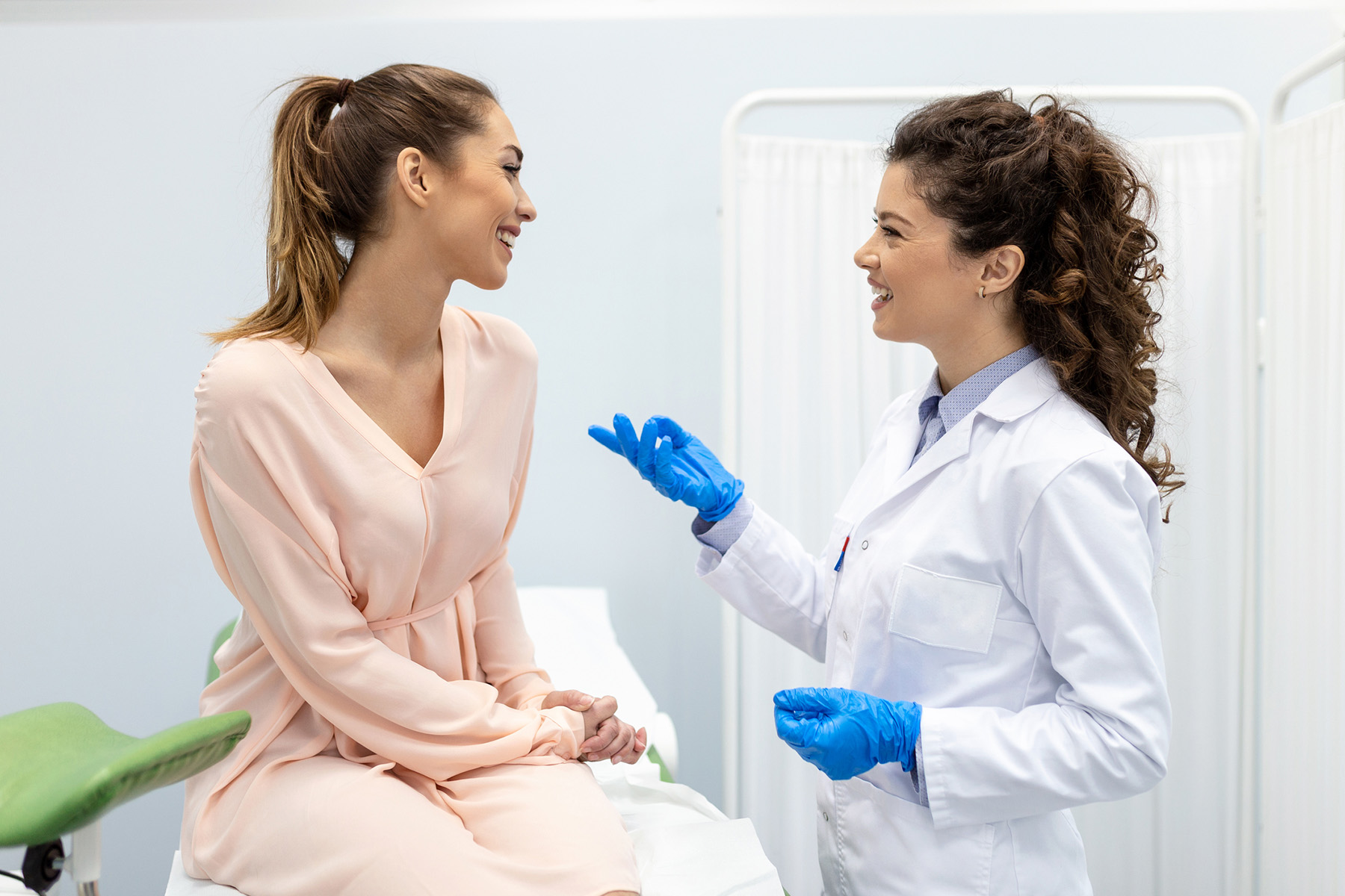 Healthcare professional consulting with a patient